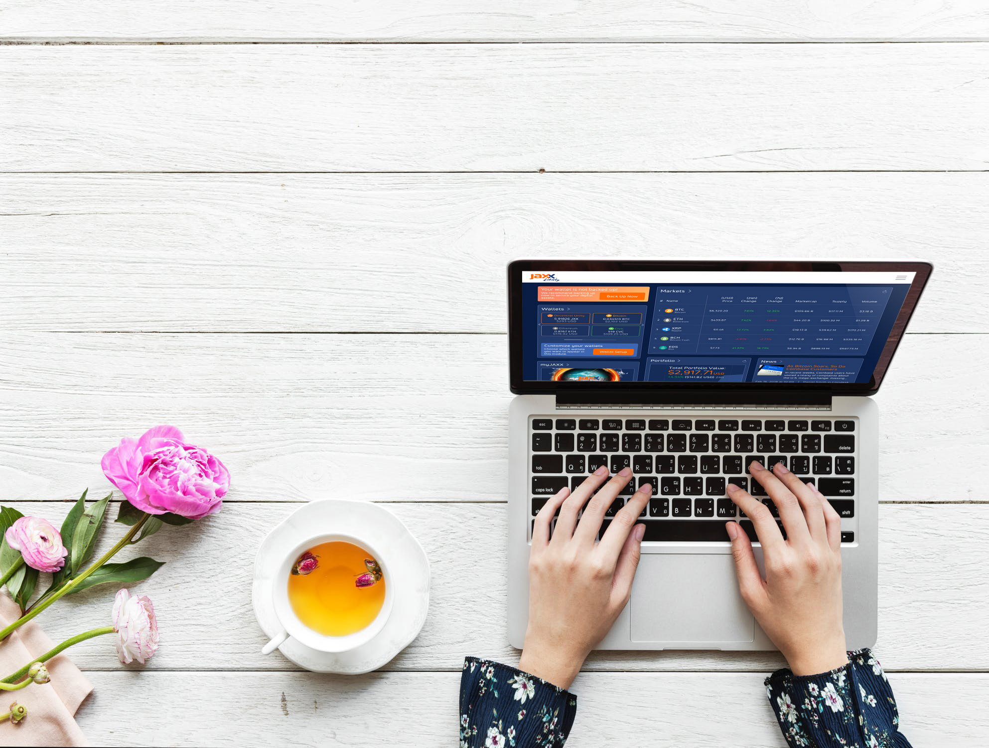 User reviewing wallet on laptop